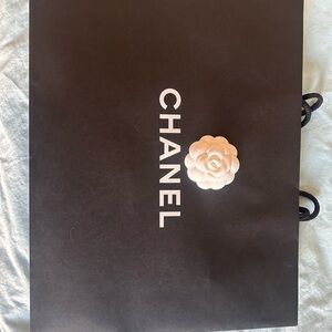 CHANEL Black Bag with White Camellia